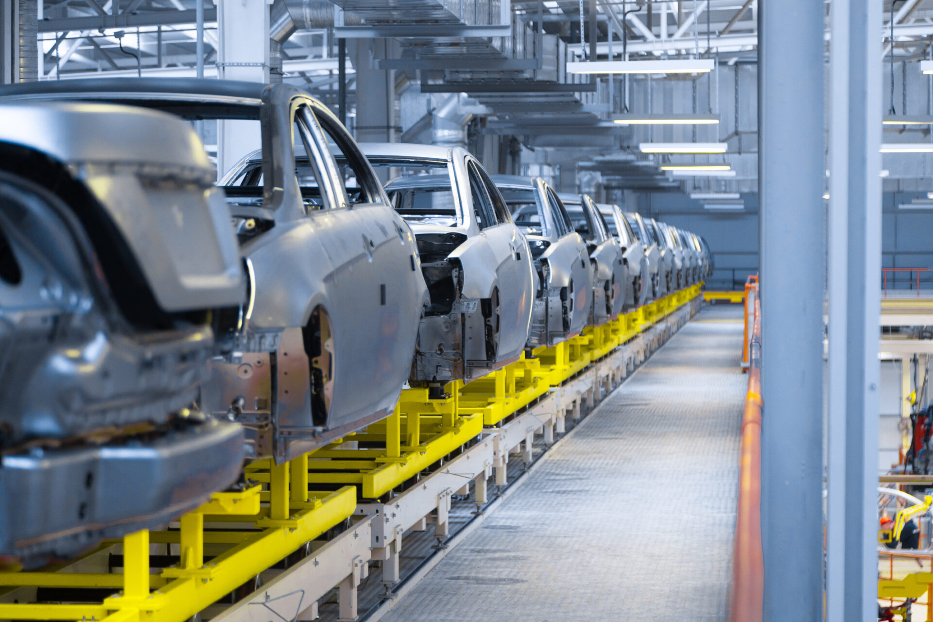 Movement of vehicles along the production line at the plant. Car Assembly shop. Car Assembly by parts